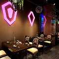 Modern Restaurant Interior With Blue Purple Lighting Circular Hanging Lights Large Screen And Dining Tables