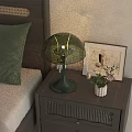 Modern Wooden Bedside Table With Green Glass Lamp White Vase Flowers And Photo Frame