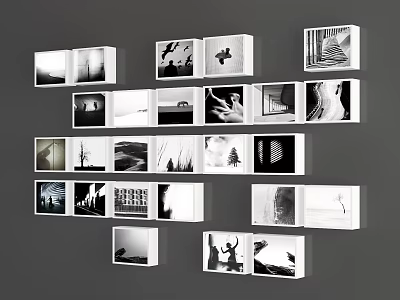 Photo Wall Featuring White Frames Displaying Black And White Photos On Gray Background Wall 3d model