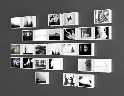 Photo Wall Featuring White Frames Displaying Black And White Photos On Gray Background Wall 3d model
