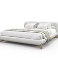 Modern Minimalist Double Bed With Wooden Legs Light Fabric Pillows Sheets And Throw Blanket