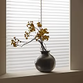 Gray Ceramic Vase With Yellow Flowers And Branches On Windowsill Against White Blinds