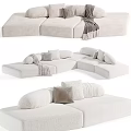 Comfortable Sectional Sofa Designs With Beige Brown White Fabric And Soft Throw Pillows 3d model