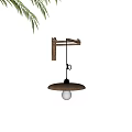 Wall Sconce with Wooden Arm Metal Shade and Warm Bulb on Beige Wall with Leaves