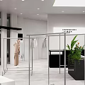 Modern Clothing Store Interior Design With Clothing Racks Hanging Clothes And Green Plants