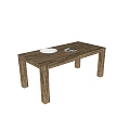 Natural Wooden Dining Table with White Plate and Magazines on Top