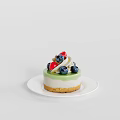 Fresh Green Topped White Layer Cake With Blueberries Strawberries And Mint Leaves On White Plate