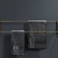 Modern Bathroom Towel Rack With Wooden Brackets And Golden Bars Holding Gray Towels