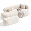 Beige And Green Tiger Patterned Irregular Shaped Sofa With Round Cushions And Plaid Blanket