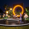 Outdoor Stage with Neon Ring Band Performers Green Plants and Lighting in Night Scene