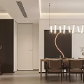 Modern Dining And Living Room Interior With Pendant Lights Dining Table Chairs And Decorative Artwork