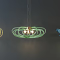 Colorful Yellow Green Blue Chandeliers with Circular Ring Design and Illuminated Bulbs