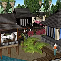 Scenic Waterfront Vacation Rental Building with Palm Trees and Sandy Beach
