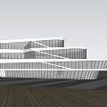 Modern Cultural Center Building Featuring Glass Facade Curved Structure And Outdoor Greenery