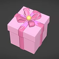 Pink Gift Box Decorated With Pink Bow And Yellow Bead On Top