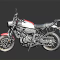 Red and White Vintage Motorcycle With Black Seat And Sleek Alloy Wheels Design