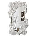 Modern Artistic Mirror With Textured White Frame Reflecting Indoor Plants And Decorative Wall Art