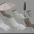 Outdoor Patio Lounge Chairs With Various Designs And Umbrellas On Stone Floor