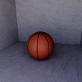 Orange Basketball With Black Stripes As Sports Equipment Placed In Gray Indoor Corner