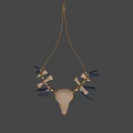 Decorative Skull Ornament With Bone Feathers And Beads Design
