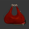 Red Leather Handbag Featuring Golden Metal Hardware And Green Red Striped Trim