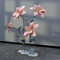 Pink Paper Floral Installation With Green Stems Leaves And White Base For Interior Decor