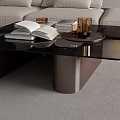 Modern Glass Top Coffee Table with Black Frame Decorative Tray and Books in Living Room
