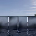 Modern Screen Wall With Geometric Hollow Design Water Reflection Blue Sky And Tree