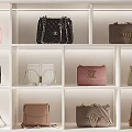 Fashionable Designer Bags In Various Styles And Colors On White Display Shelves