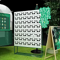 Starbucks Mobile Coffee Cart Outdoor Setup With Green Plants Chairs Tables Umbrella And Signboard