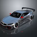 Silver Modified BMW Sports Car With Rear Spoiler Red Side Mirrors And Black Wheels