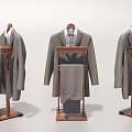 Men's Suits Display On Wooden Stands With Jackets And Pants In White Background