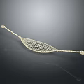 Intricate Golden Mesh Metal Sculpture Handcrafted with Decorative Wire Ends and Artistic Design