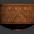 Orange Bowl Shaped Carved Sculpture With Intricate Geometric Patterns On Surface