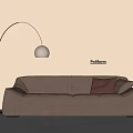 Modern Brown Two-Seater Sofa With Arching Floor Lamp Cushion And Beige Wall Interior