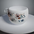 Beautiful White Ceramic Cup With Floral Patterns On Round White Plate 3d model