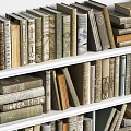 Books and Magazines Arranged Neatly on White Bookshelves with Various Sizes and Colors