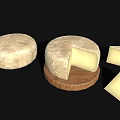 Whole Round Artisanal Cheese with Sliced Pieces on Wooden Board