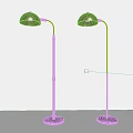 Two Metallic Floor Lamps With Sleek Design Round Shades And Tall Stands