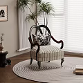 Accent Chair On Woven Rug With Striped Upholstery Near Potted Plant Books And Window Blinds