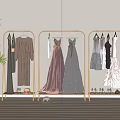 Clothes Racks Holding Different Dresses Gowns Shoes and Hat in Indoor Area with Light Wall