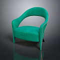 Green Velvet Armchair With Curved Armrests And Decorative Studs Design