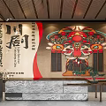 Chuan Opera Themed Exhibition Hall With Traditional Mask Wall Decor And Marble Reception Desk