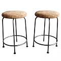 Two Brown Padded Bar Stools With Black Metal Frames And Sturdy Base 3d model