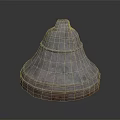 Shiny Metallic Household Item With Conical Shape And Red Base