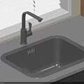 Gray Kitchen Sink With Silver Faucet On Light Colored Countertop Near White Windowsill With Blinds