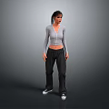 Child in Gray Long Sleeve Top Black Pants and White Sneakers Against Gray Gradient Background
