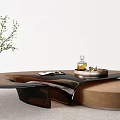 Modern Coffee Table With Black Top Brown Base Green Plant And Tray Decor