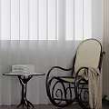 Stylish Leisure Chair Featuring Rattan Seat Metal Frame And Side Table With Books