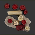 Red and Cream Melted Candles With Irregular Shapes and Wax Drips on Base